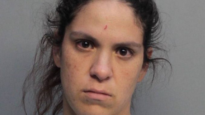b59659ef-Sasha-Gonzalez-Booking-Photo.jpg