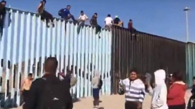 Migrant-Caravan-Fence.jpg